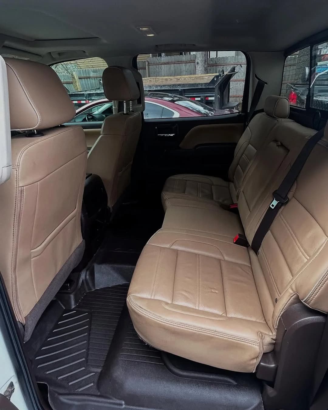 GMC Denali rear seating area after pet-hair and headliner work